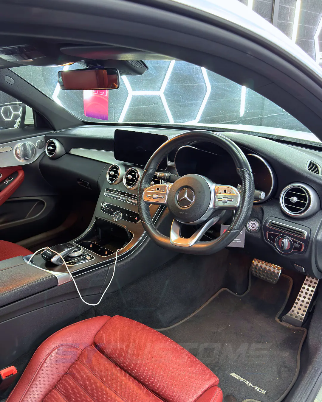 Mercedes C-Class Coupe (Facelift) before oem ambient lighting, custom steering wheel, car accessories, starlight installation