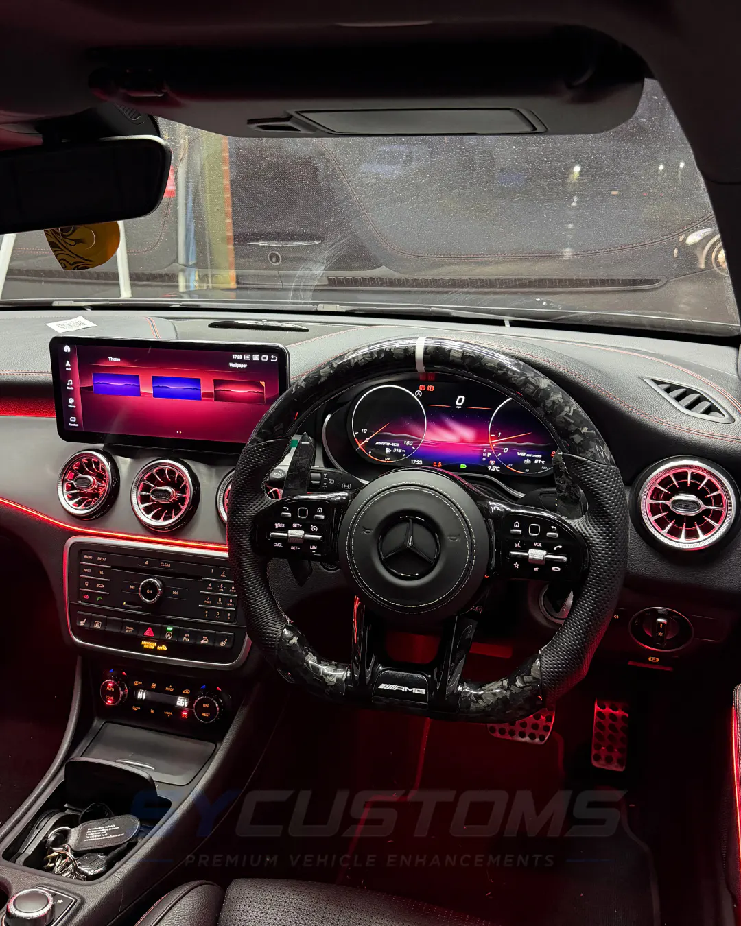 Mercedes CLA W117 after oem ambient lighting, screen upgrade, digital cluster upgrade, custom steering wheel installation